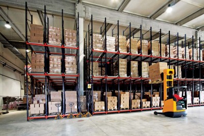 bigstockphoto_Warehouse_Forklifter_4188438