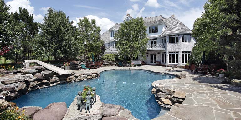 bigstock_Luxury_Home_With_Swimming_Pool_7213556