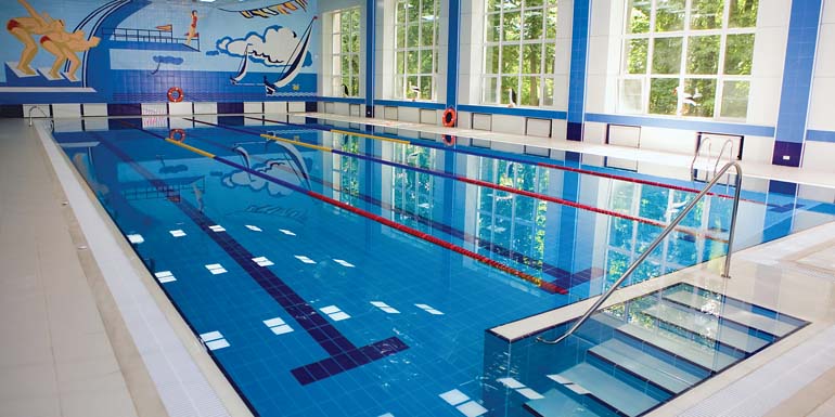 Empty indoors public swimming pool at day time