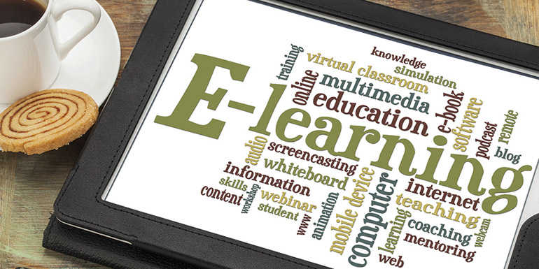 online education concept - e-learning word cloud on a digital ta