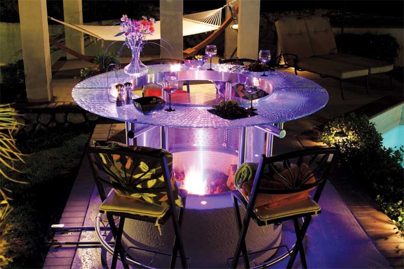 Illuminated fire pit table with chairs