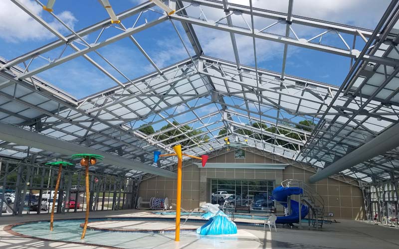 outdoor pool with retractable roof