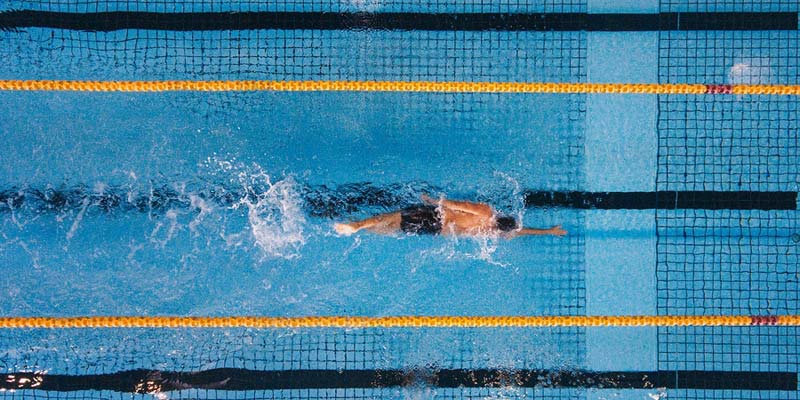 Swimmer in competition pool