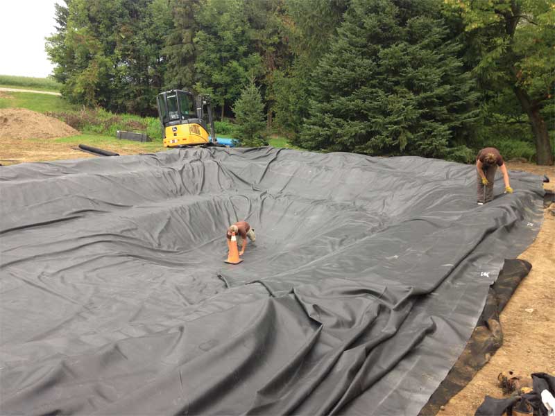 The liner installation is a heavy job that can require several team members.