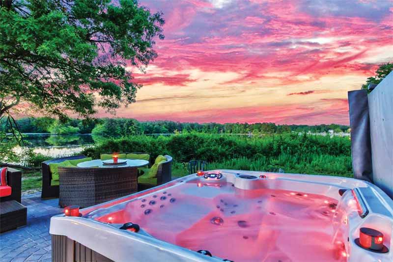 Placement of the hot tub is the first step in creating a backyard oasis for a new client.