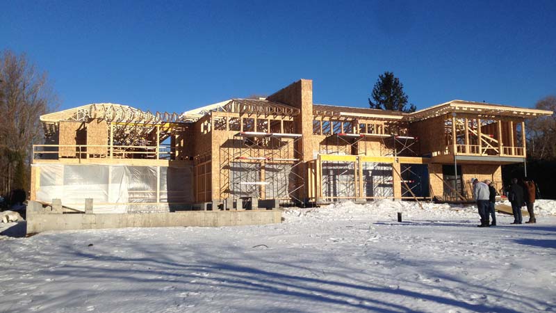 Construction of the residence began in the late fall (2015) and continued throughout the winter months, which included the pouring of the concrete foundation and traditional wood framing of the home’s walls and roof.