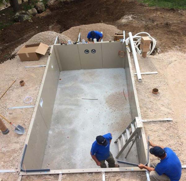 The location of the pool was designed around the large, pre-existing deck that was built off the home and into the hillside.