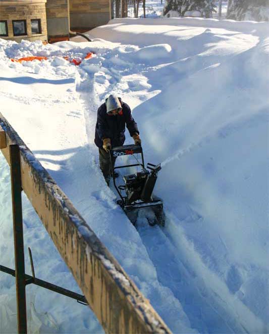 Building pools through the winter requires extra work, which may include clearing snow from the construction site.