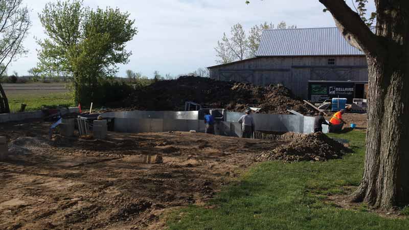 Installing a cast-concrete rock waterfall