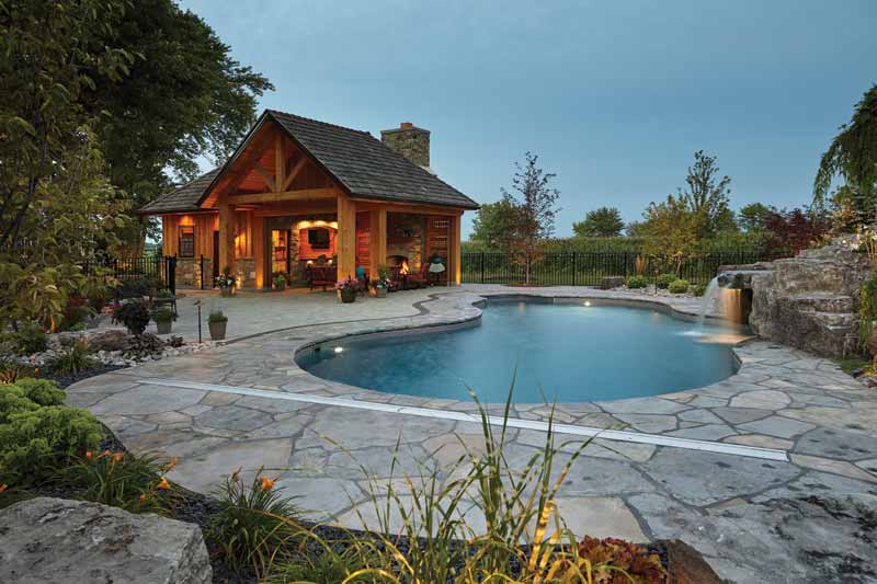 The outdoor living space was constructed using plenty of timber and stone.