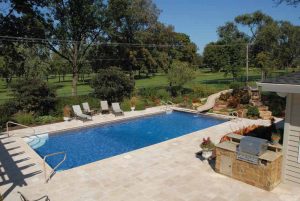 Slides surrounded by cast-concrete rock offer a more exciting water feature.