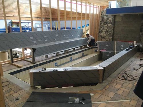 earl mah aquatic centre. The designers planned the appearance to match the original shape of the installation, including its staircase and shape of the benches.