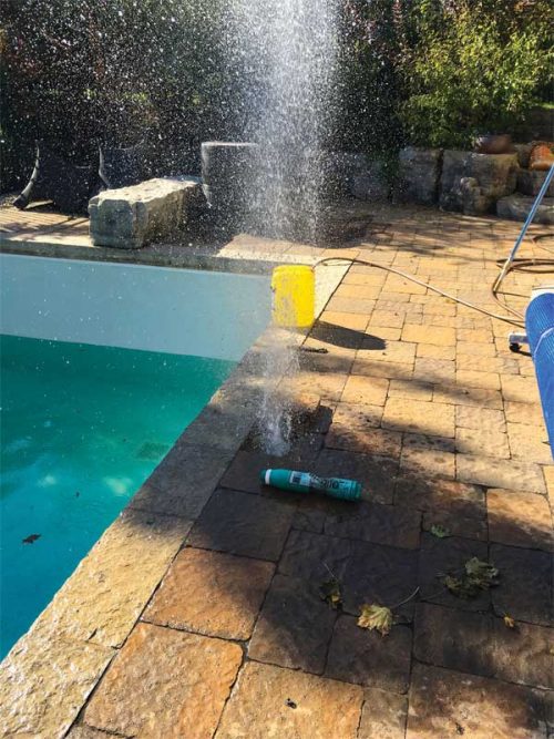 The pool’s plumbing should be completely drained by using compressed air to blow out water from the recirculation system.