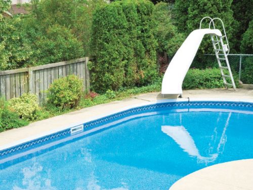 Installing a fence, screens, or shrubs around the pool can lessen the chances of water evaporation and cooling.