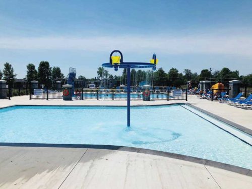 To make the dumping buckets feature even more fun for kids, a ring of bubblers was installed around the base.