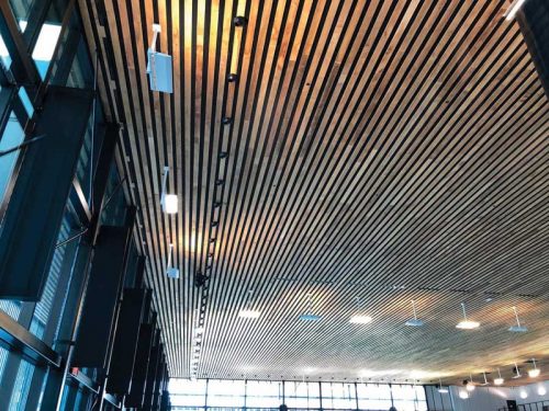 The project engineer and general contractor, Stantec, integrated the ducts into the building’s cedar ceiling, with air nozzles projecting slightly from the surface to direct air into the breathing zone and along the windows.