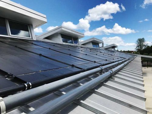 The installation of solar panels to heat outdoor pools has greatly reduced energy usage, greenhouse gas (GHG) emissions, and energy costs. 