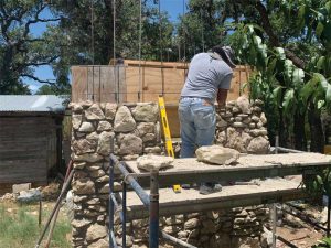 The lower structure of the pool equipment room was built entirely from the stone removed during the excavation.