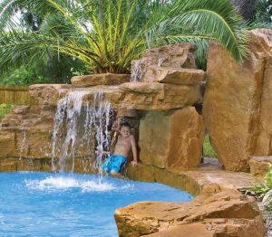 Caves and grottos are basically a ‘super’ waterfall feature. Not only do they provide all the benefits of a waterfall (visual beauty and the calming sound of cascading water), but also add an element of fun and excitement—especially for children.