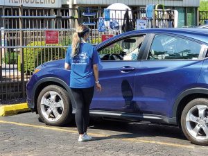 Some specialty retailers have employees wearing masks go out to customer vehicles in their parking lot to collect water samples and bring them into the store to be tested.