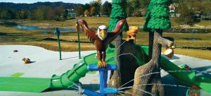 The most prominent feature is a large lifelike eagle—the mascot of Morehead State University—that incorporates the blue and yellow colours of the institution and sits atop the splash pad’s Spray n’ Prey-themed water attraction.