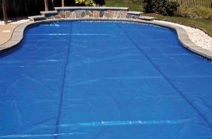 Solar bubble blankets are great at the beginning of the season to help heat the water more quickly; however, they can be bulky and tough to move, not to mention the additional dirt and debris a homeowner may be inadvertently introducing to the pool when dragging it across their yard.