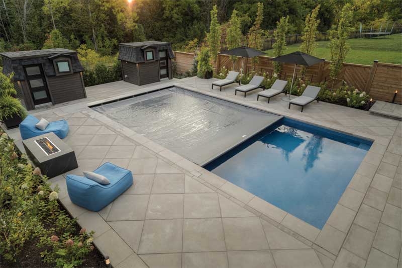 One of the updates the client requested was a charcoal-coloured automatic cover which co-ordinates with the colour palette selected for the backyard’s design.