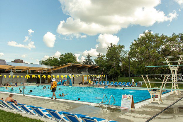 Queen Elizabeth Outdoor Pool celebrated its 100th birthday in attendance of community volunteers and city officials with an inauguration of a mural reflecting the changes the community went through over a century.