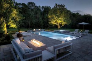 Four lights were added to the pool, two in the pool, one in the bubbler, and one in the spa. The distribution of the lights accentuates all the angles and water flow.