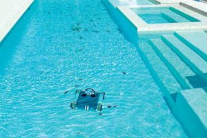 A robotic cleaner works similar to a moving pump and filter, removing dirt and debris at the bottom of the pool.