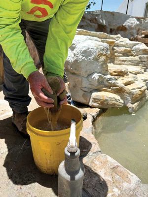 Having a bucket, hand sprayer, water hose, and a sponge are all the tools a builder needs to achieve the most realistic and esthetically pleasing artificial rock for pool water features.