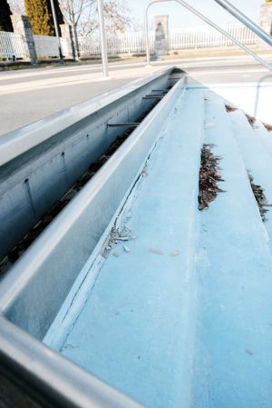 The joint between the gutter and the pool shell had become compromised, leading to the leak when the pool was full.