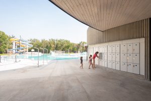 The exterior lockers are placed close to the pool.