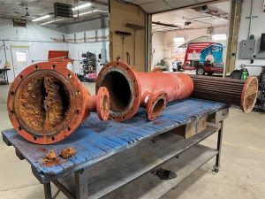 Once a heat exchanger is disassembled, the damage, corrosion, and deposits that can plague performance are easily noticeable.