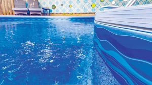 The colour-changing vinyl liner pattern is more impressive in a larger, freeform pool because there are more opportunities for the pattern to flow around the pool and capture the light and change colour.