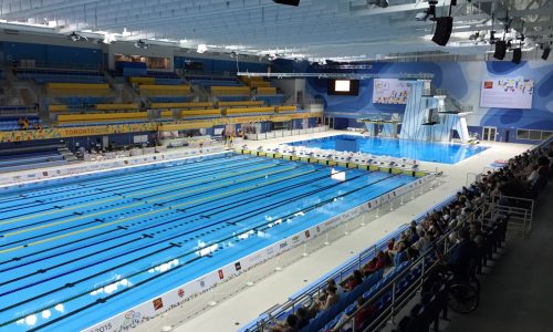 Indoor Olympic-size swimming pool in Toronto set up for competitive events.