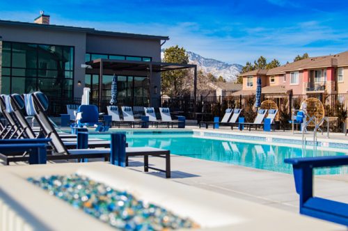 empty poolside with pool chairs