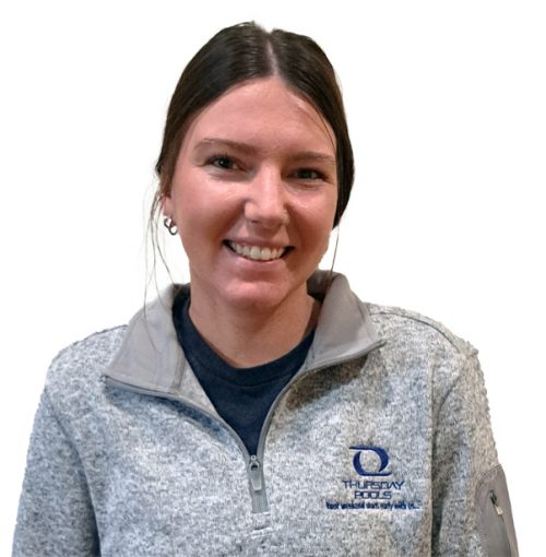 headshot of a woman wearing a grey sweatshirt