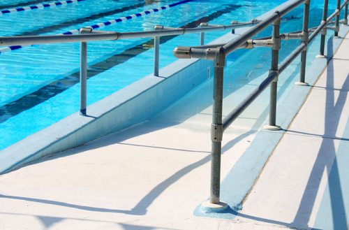 Handicap ramp leading into community swimming pool